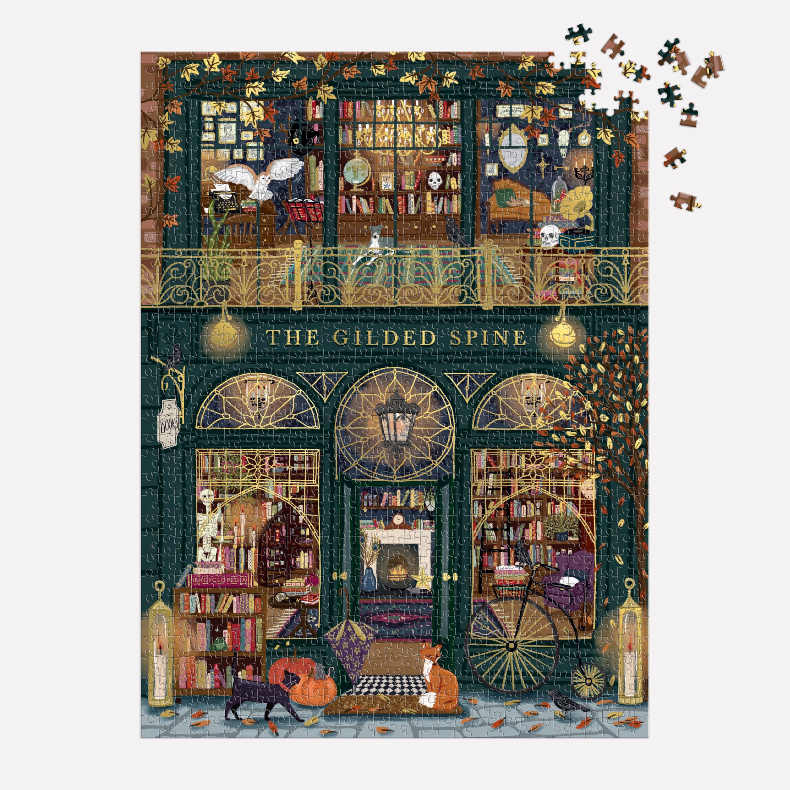 Galison puzzle insert and scattered pieces for easier assembly and reference