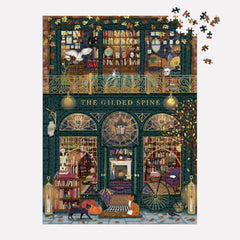 Galison puzzle insert and scattered pieces for easier assembly and reference