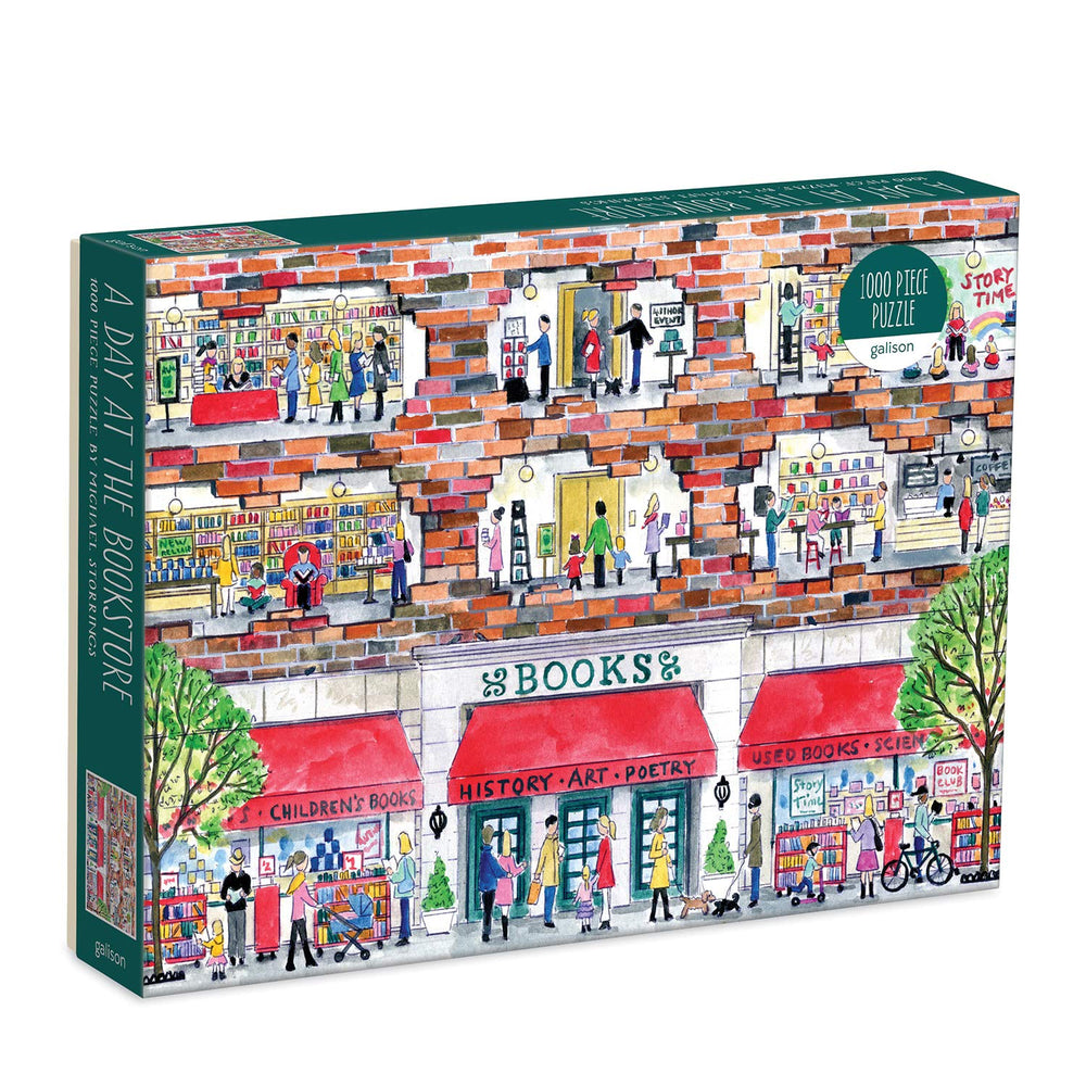 Galison Michael Storrings puzzle box cover shows a cozy bookstore scene perfect for quiet evenings