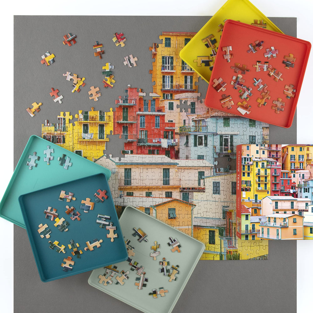 Galison Puzzle Sorting Tray Set featuring colorful trays for easy sorting during sessions