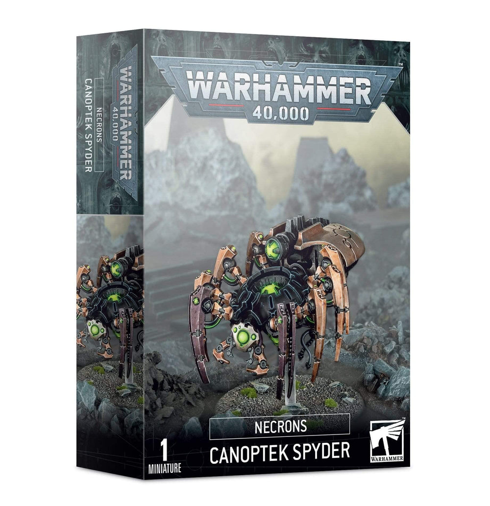 Games Workshop Canoptek Spyder components arranged for assembly, enabling pose customization.