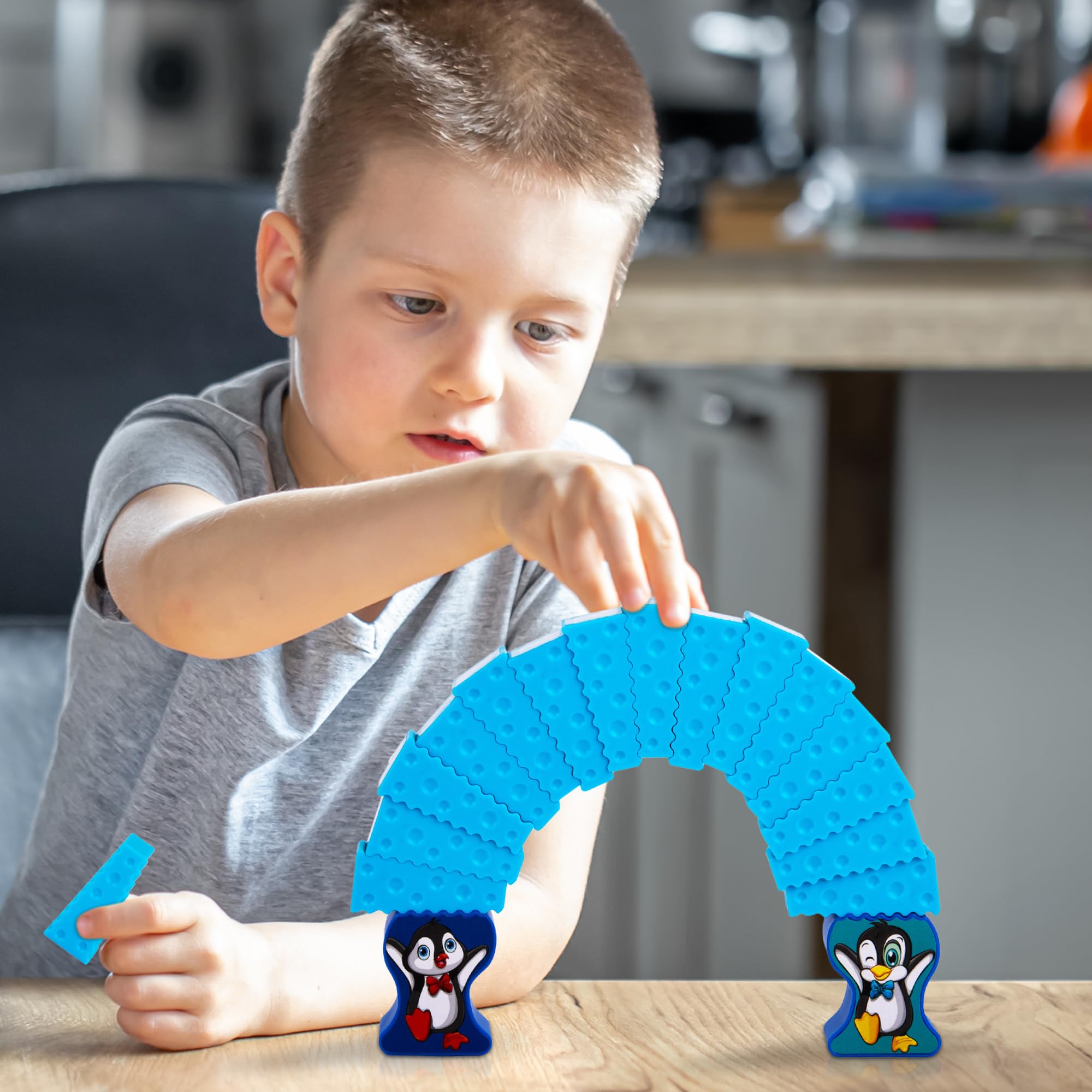 Gamie gift-idea-penguin-game suggests screen-free holiday fun.