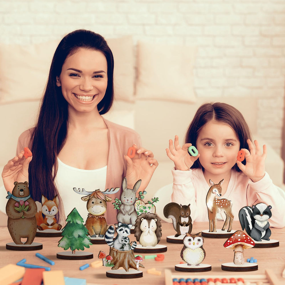 Geetery moose cutouts creating bold forest centerpieces for woodland parties.