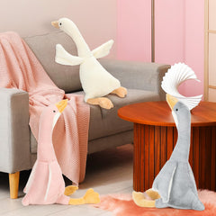 Goose plush on a bed, perfect as a sleeping companion.
