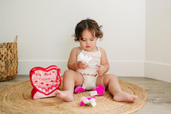 Genius Baby Toys pink cupcake with bell inside for audible play