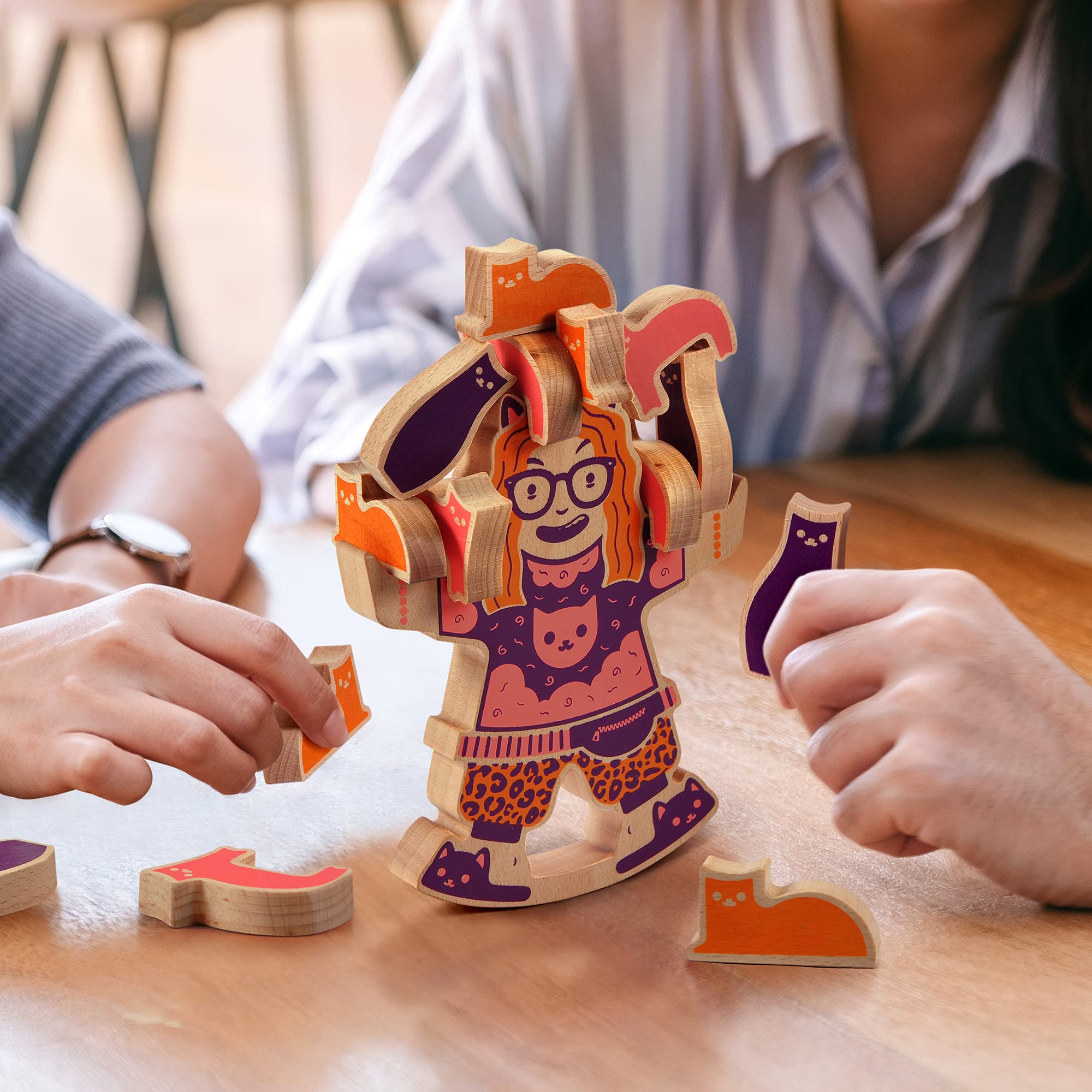 Genuine Fred stacking game pieces ready for solo or group play.
