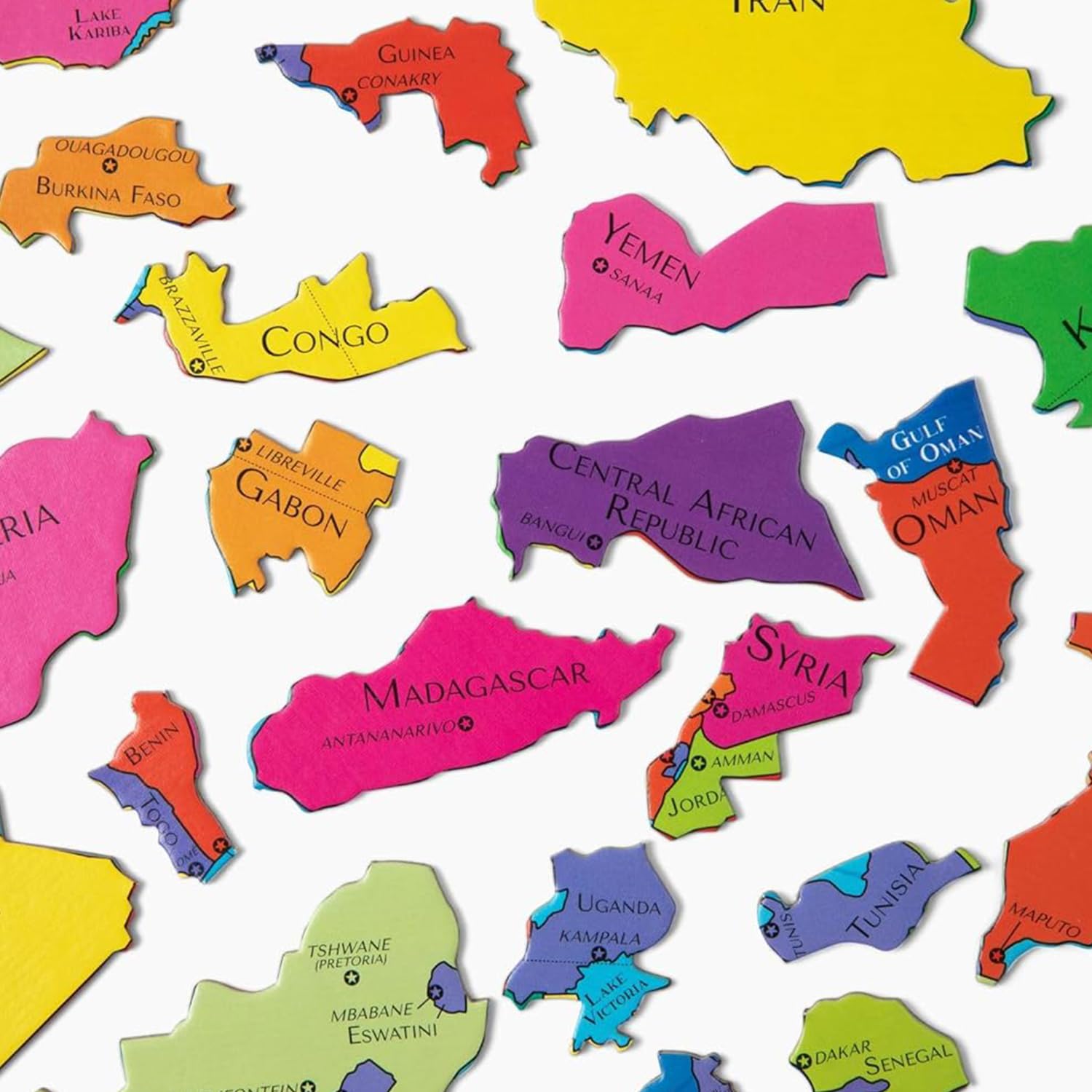 GeoToys GeoPuzzle family playing together to build geography skills