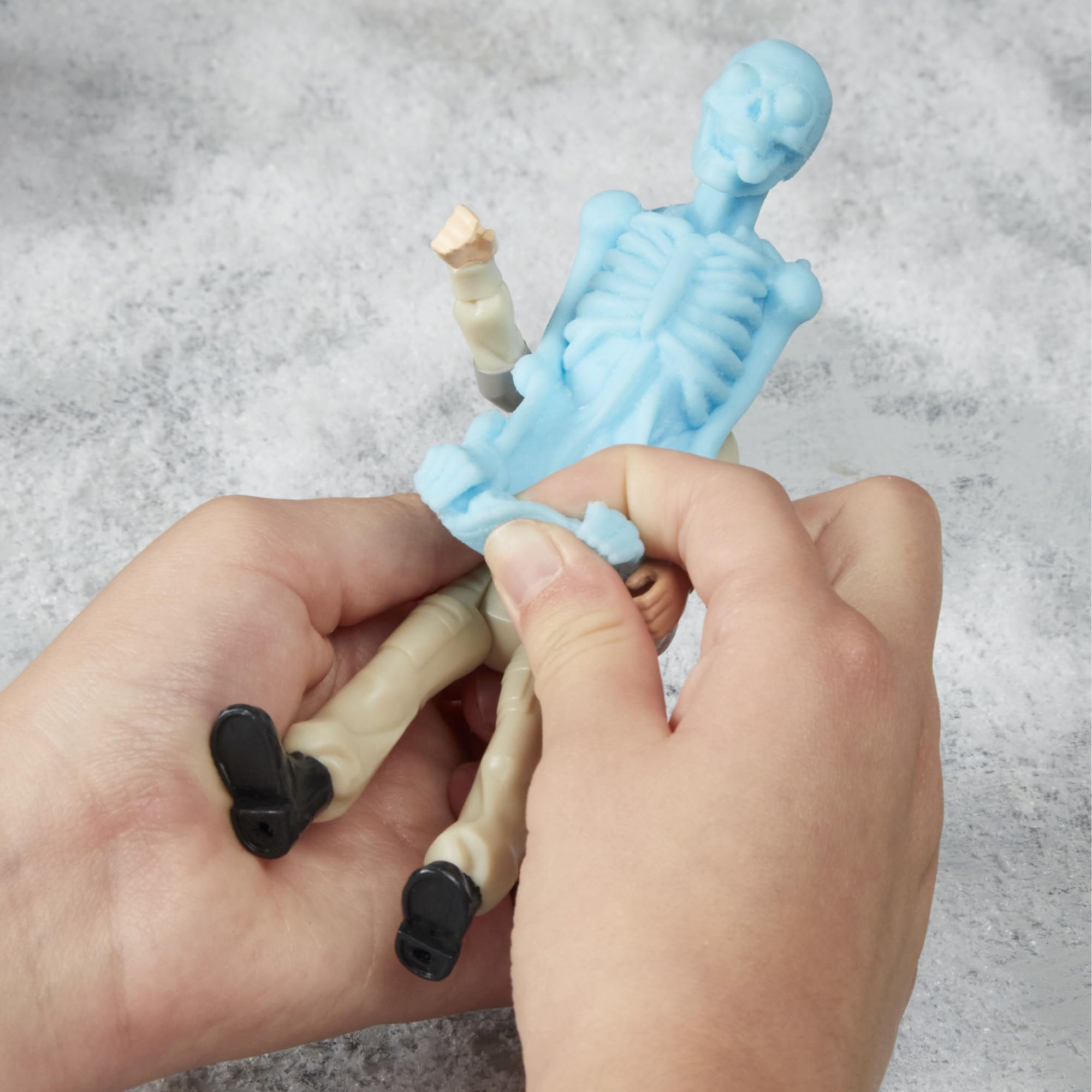 Phoebe Spengler figure packaging for display and gifting.