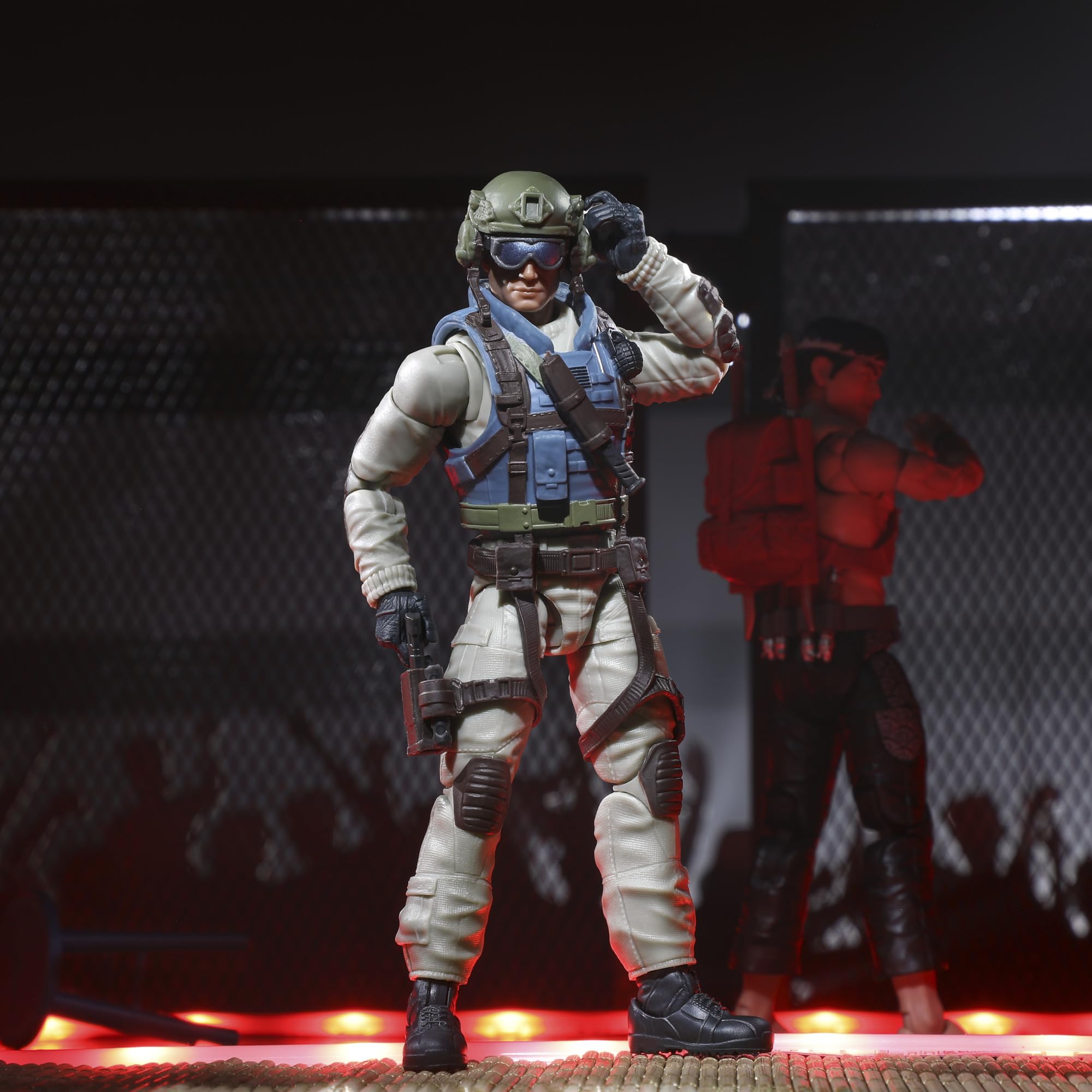 Open packaging design showcases the figure and loadout
