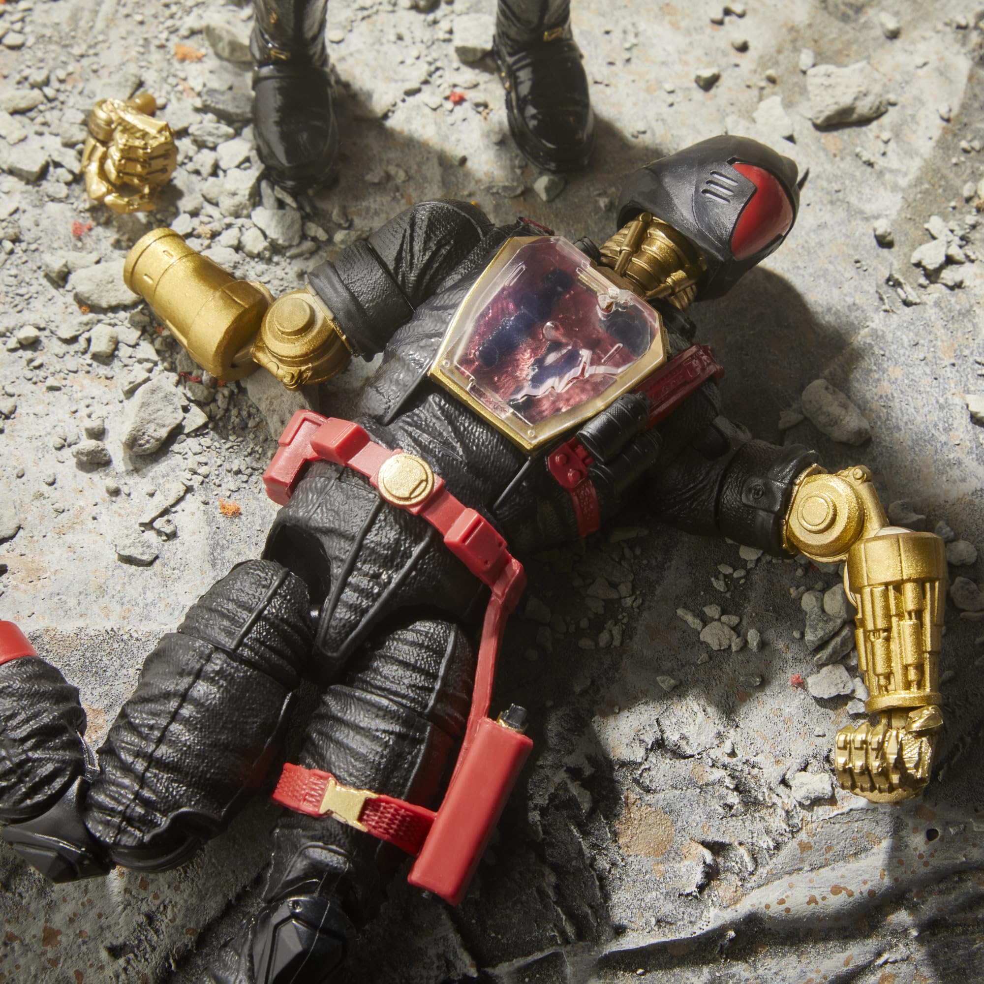 G.I. Joe Iron Grenadier B.A.T. battle-damaged chest plate adds drama to scenes.