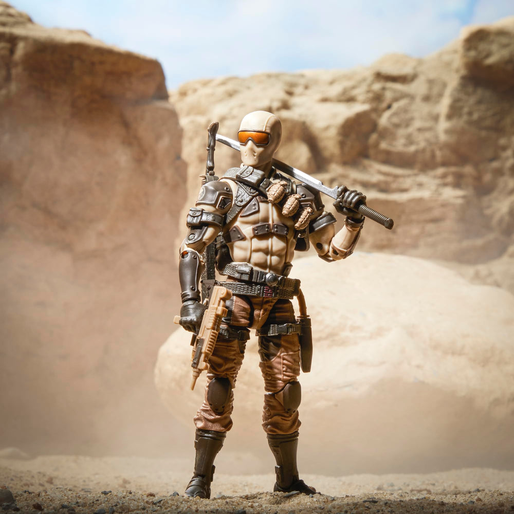 G.I. Joe Desert Commando Snake Eyes suppressor accessory on right weapon.
