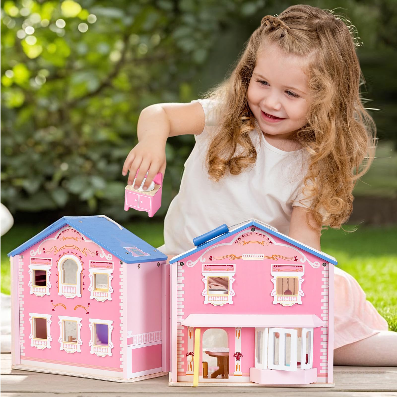 Giant bean pink 2-story dollhouse invites imaginative storytelling.