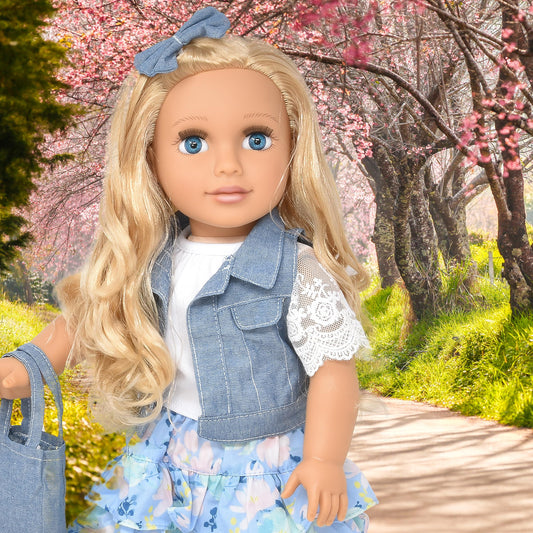 Gift Boutique 18 inch girl doll with blue eyes inspires nurturing storytelling.