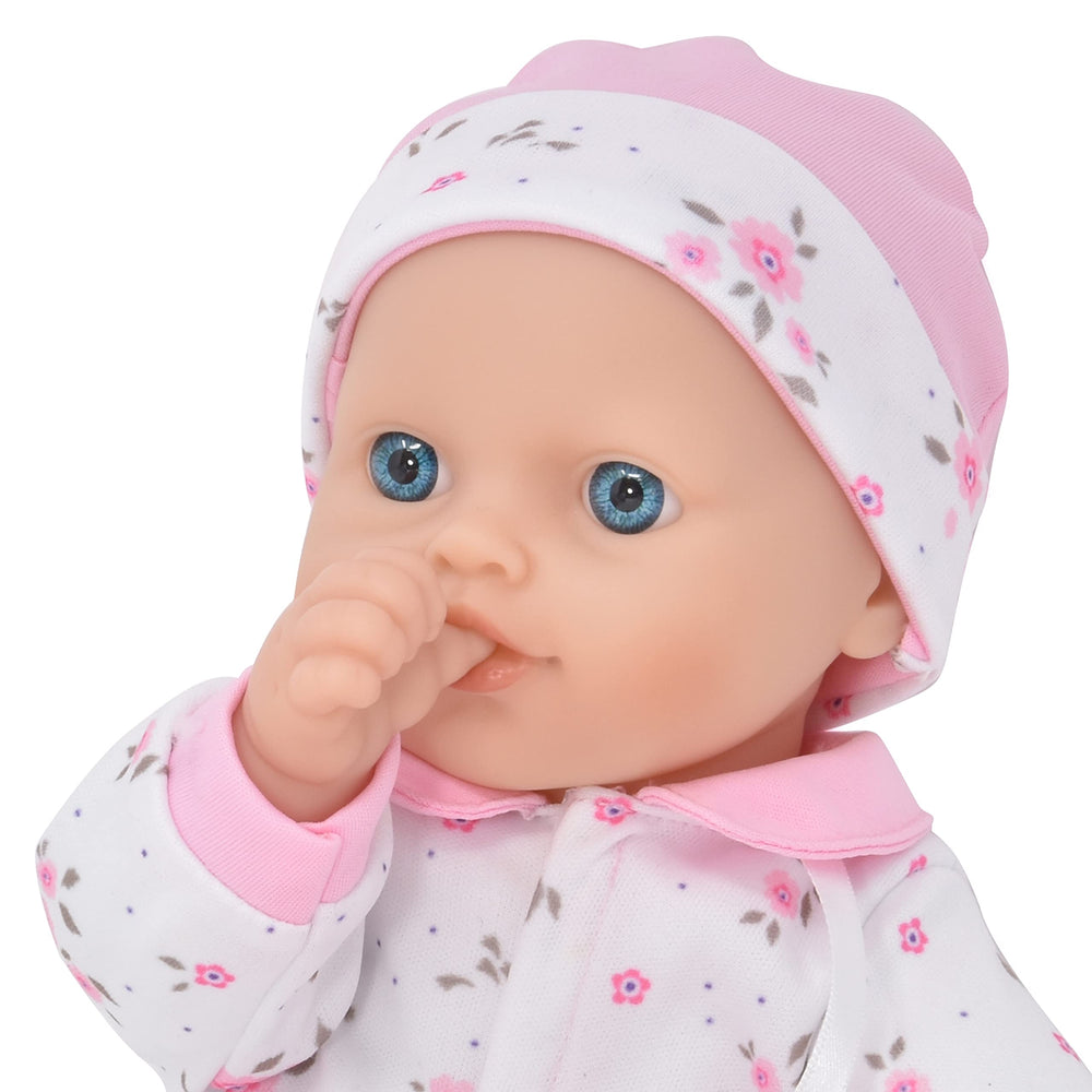 Gift Boutique baby bottle included for realistic feeding and pretend play.