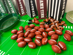 GiftExpress football fidget spinner in goody bag, perfect party favor for kids’ birthdays.