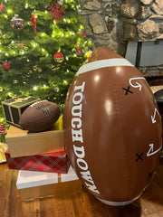 GiftExpress giant football as a photoshoot prop for parties and smiles.
