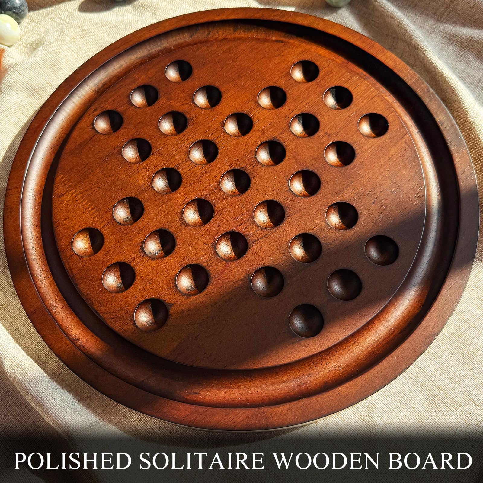 Giftqulo Solitaire board grooves hold removed marbles, keeping gameplay tidy between moves.