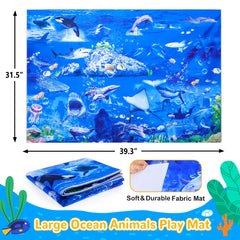 GINMIC sea turtle figure inviting curious discovery on the mat