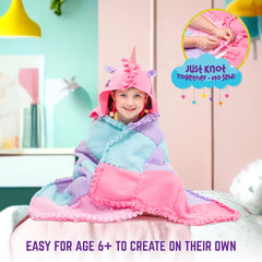 GirlZone Unicorn Snuggles 32-piece quilt kit laid out for easy assembly