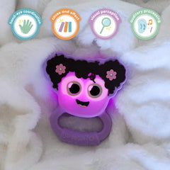 Glo Pals Light-Up Rattle during tummy time with glow and soft rattle.