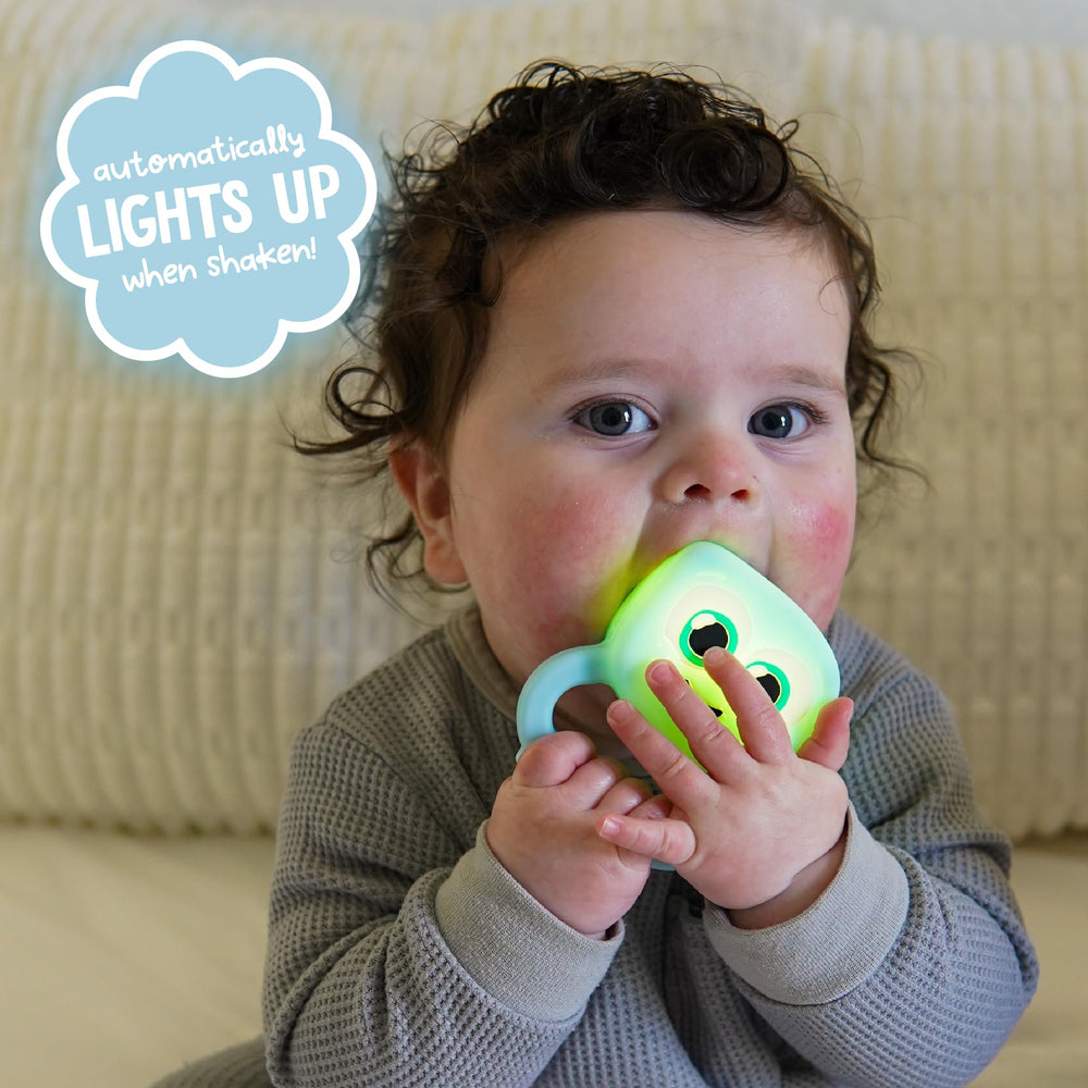 Glo Pals soft silicone baby rattle for gentle handling and safe teething exploration