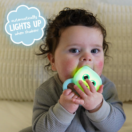 Glo Pals soft silicone baby rattle for gentle handling and safe teething exploration