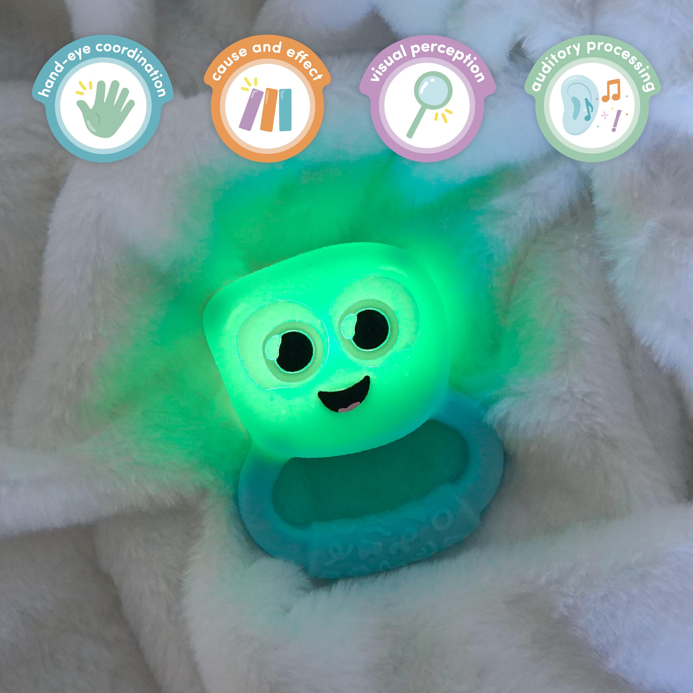 Glo Pals tummy time rattle glows while babies lift and reach for exploration