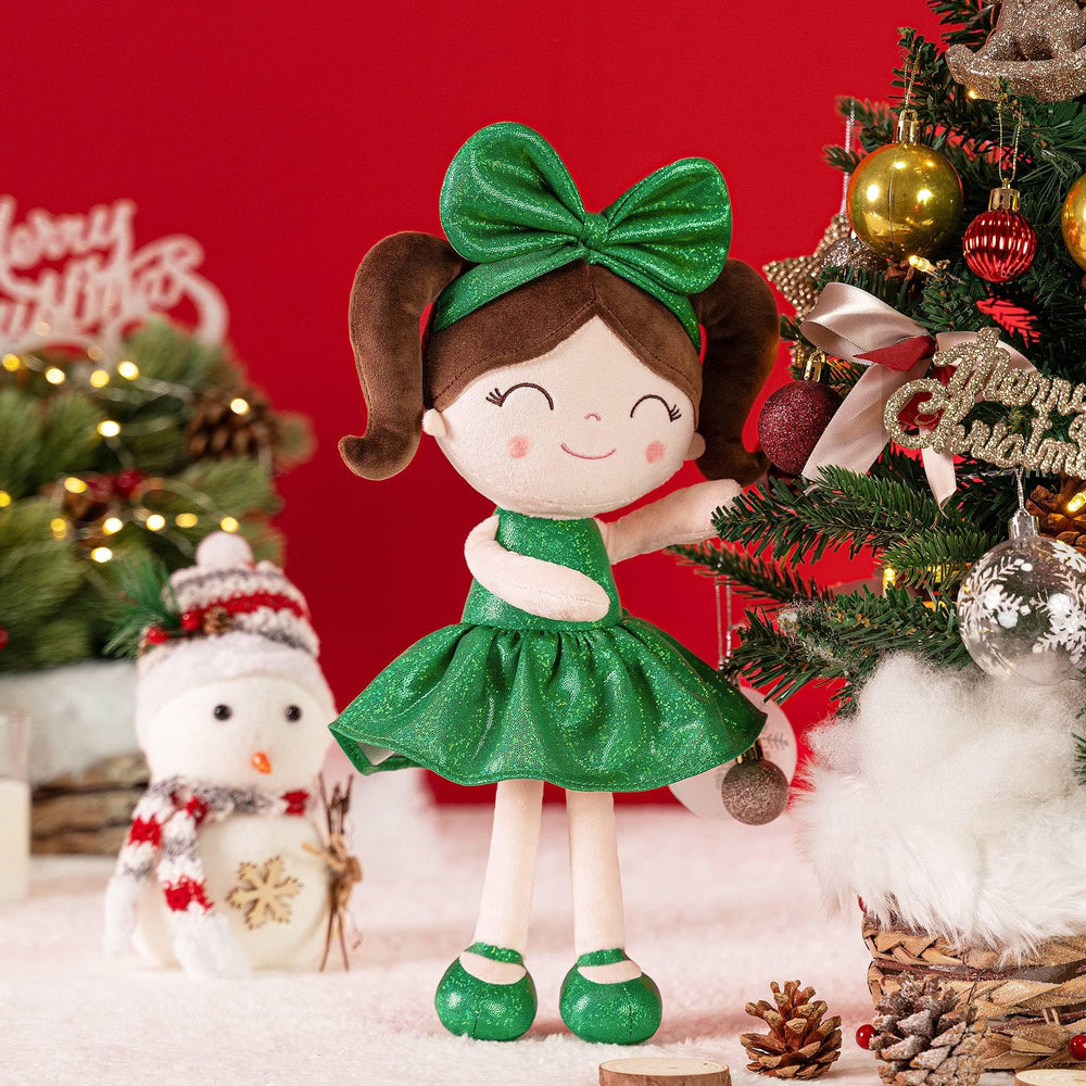 Gloveleya Christmas Baby Doll holding a stocking for holiday decor and play