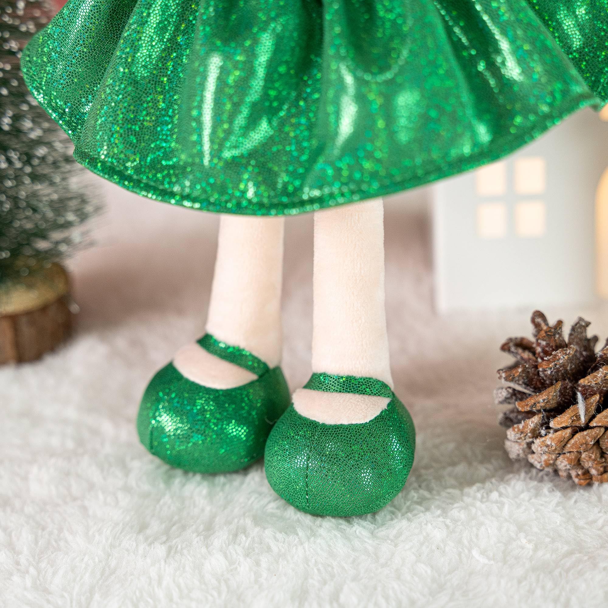 Gloveleya Christmas Baby Doll ornament display enhances holiday ambience