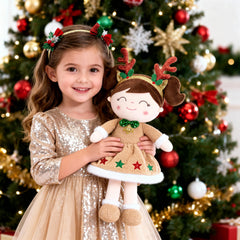 Gloveleya Christmas Reindeer Girl plush sits beneath the tree inviting imagination.