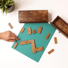 GoCraft dominoes stored in slide-on wooden box, perfect for indoor and outdoor play.