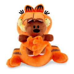 Golden Bell Garfield plush close-up with embroidered features and lasting charm.