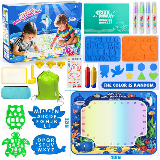 Child using the water pen on the Gorispi mat to doodle without mess.