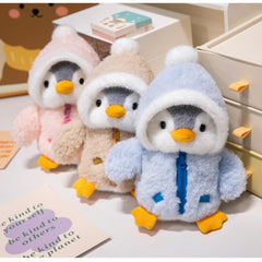 GPPYMX penguin plush pink hat brightens a kid's room display.
