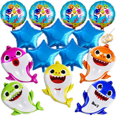 GRAME shark family balloons brighten a kid's party scene.