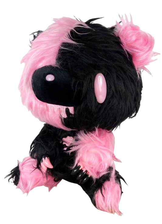 Great Eastern Gloomy Bear long-hair fur close-up highlights cozy texture.