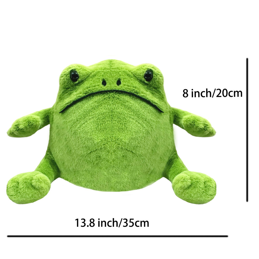 Green Frog stuffed animal beside books for a cozy bedtime companion