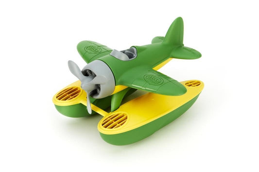 Green Toys Seaplane floating in tub for bath-time play and imagination