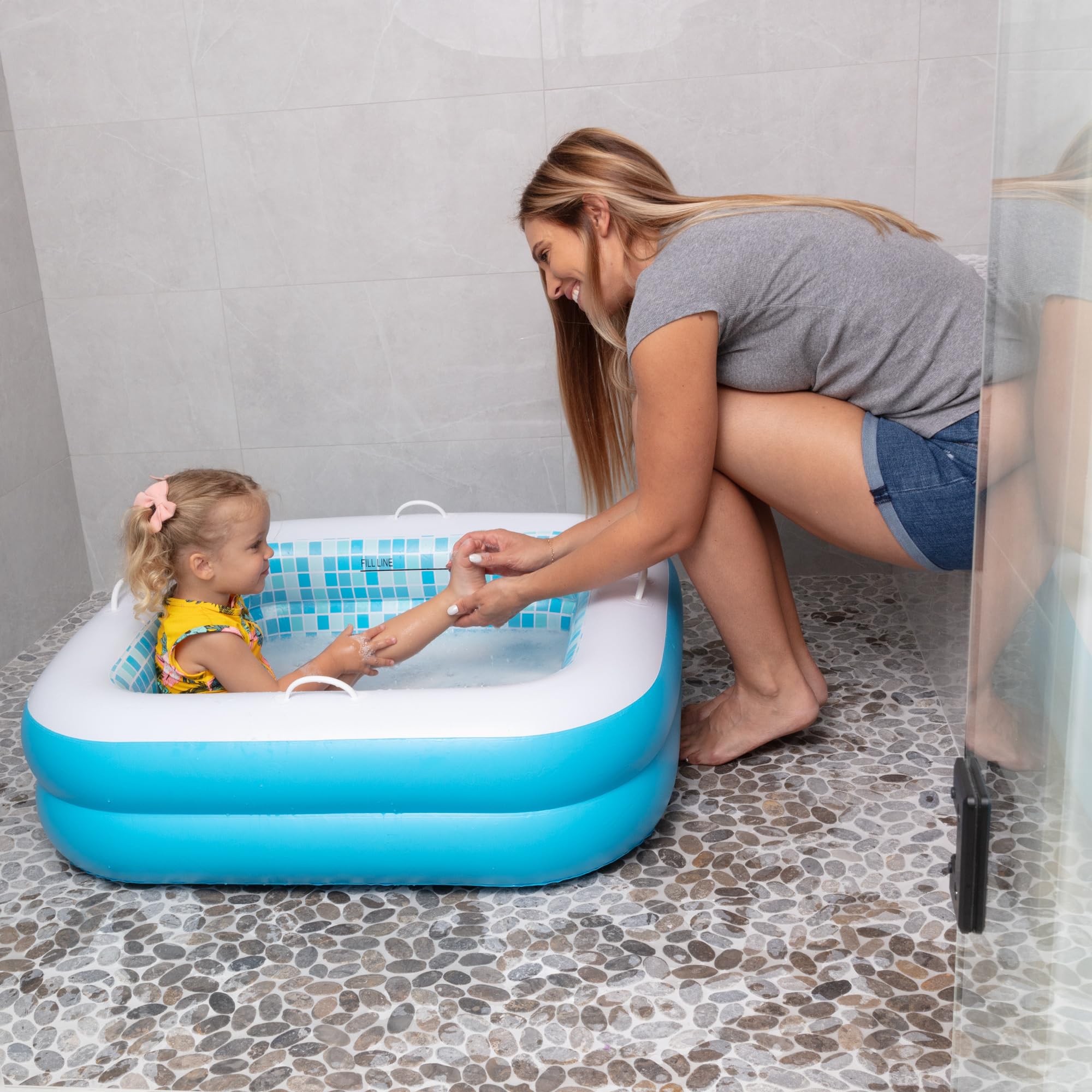 GRIP A POOL built-in drain for quick water removal after play.