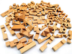 Multi-design wooden puzzle pack for varied challenges