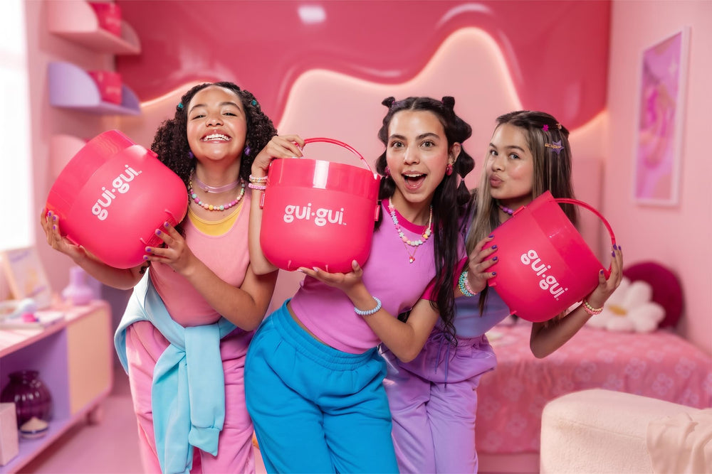 Gui Gui LOTL Lux jelli slime stretched to show dense, bouncy elasticity