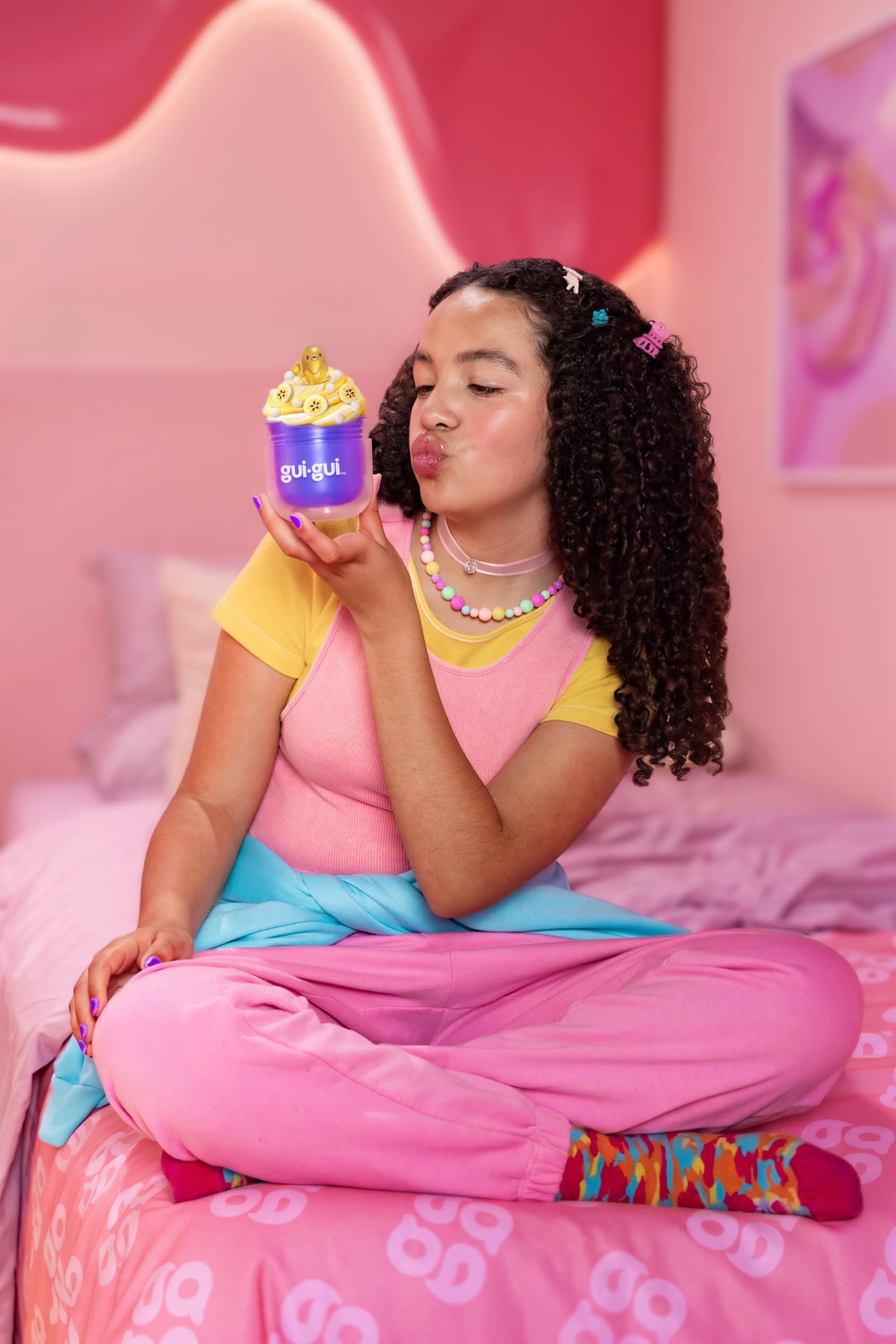 Gui Gui Poodle Power butter slime being scooped for creamy, smooth play