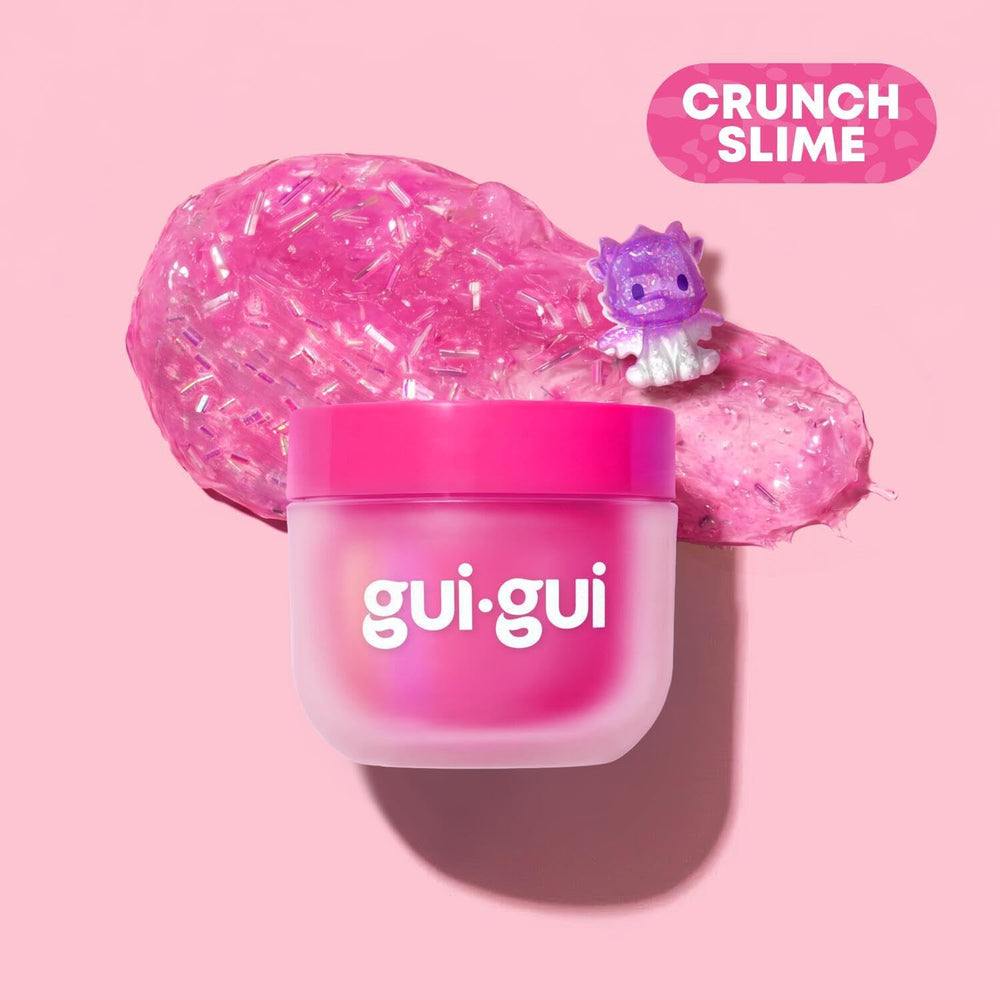 Gui Gui slimes beside a hand to show jar size and easy handling benefit