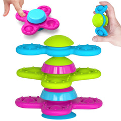 Guibola suction cup spinner toy during bath promotes safe sensory play.