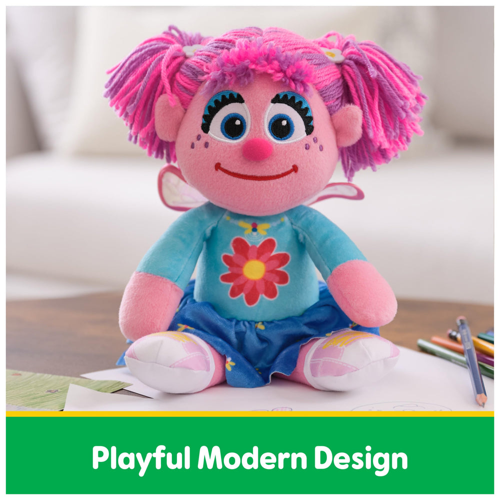 GUND Abby Cadabby Take Along Buddy plush, embroidered face detail for friendly expression.