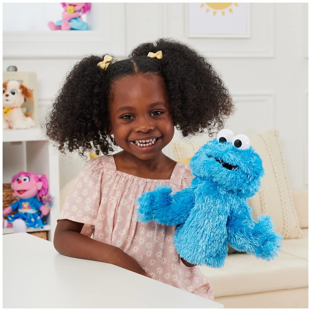 GUND Cookie Monster blue plush hand puppet, perfect for cuddly play.