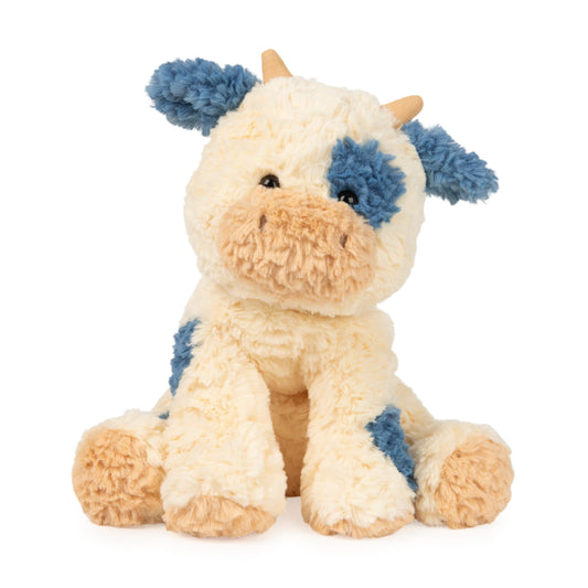 GUND Cozys Cow plush in cream fur with navy spots, ideal for comforting bedtime moments.