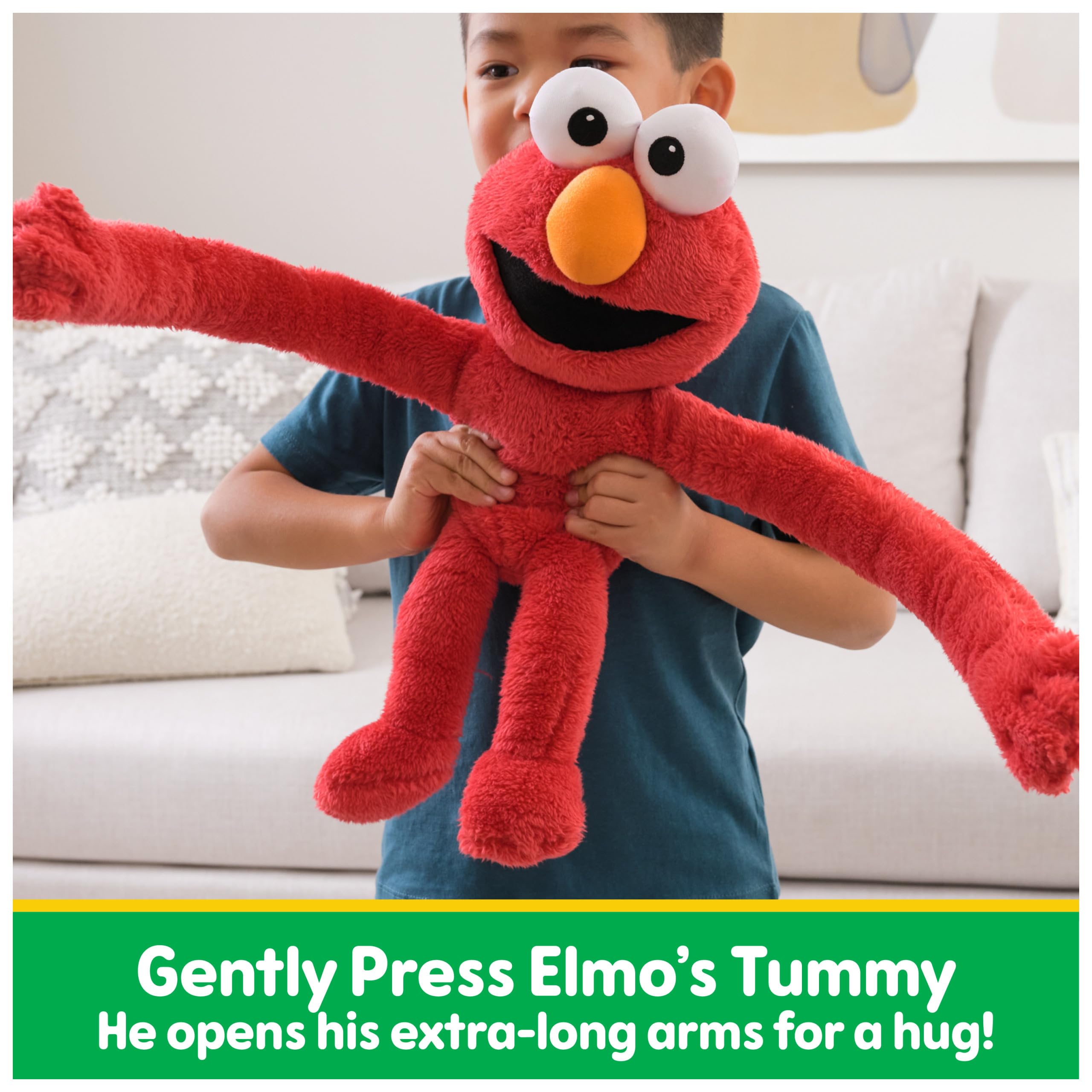 GUND Elmo tummy press action invites a warm hug back.