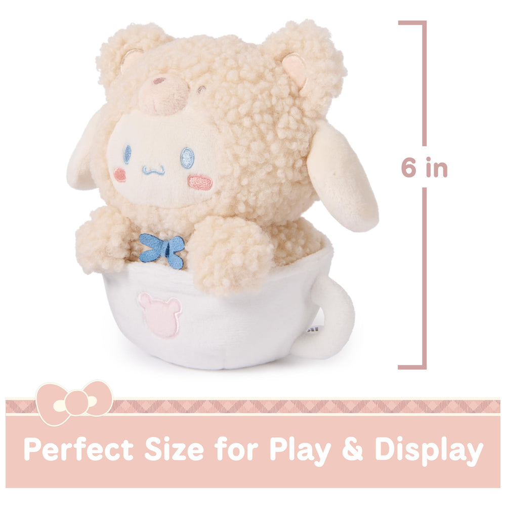 GUND Café Latte bear wears blue faux suede bowtie for charm.