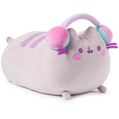 GUND Pusheen Gamer Squisheen plush lounging with headphones, a soft squeezable desk buddy.